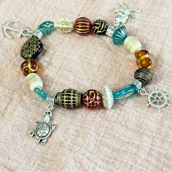 2/$10 Nautical Charm Bracelet with Silver and Gold Accents - Picture 2 of 3